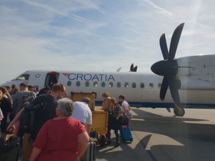 Propeller Plane to Split